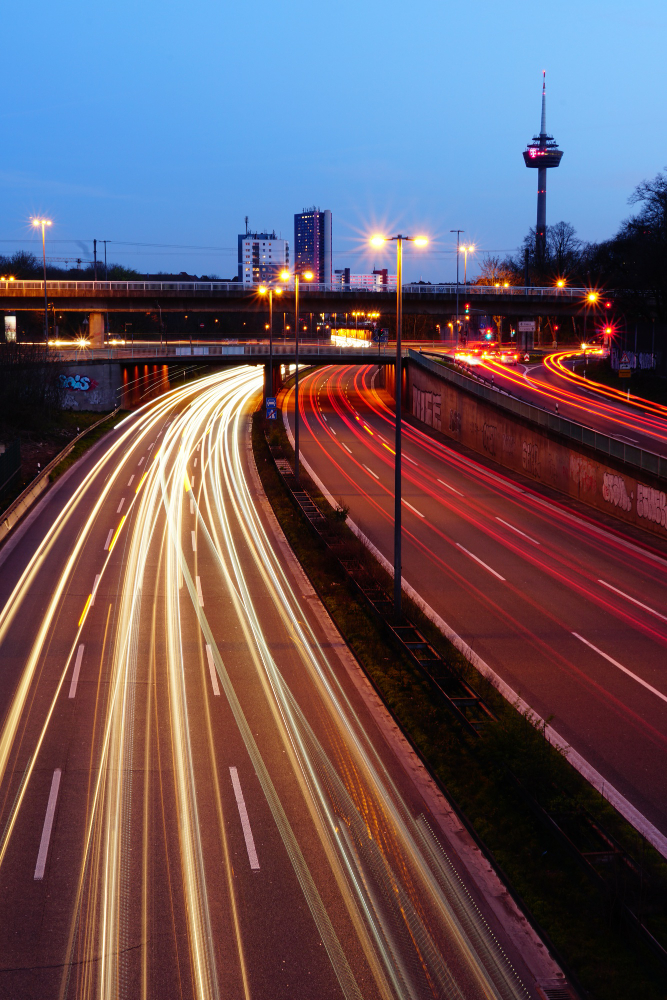 vertical-high-angle-shot-illuminated-highway-night